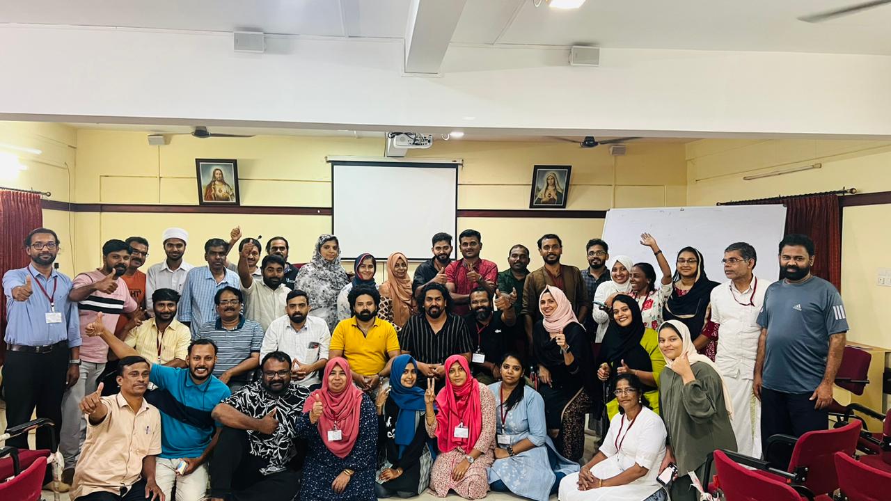 Previous batch participants group photo indoors
